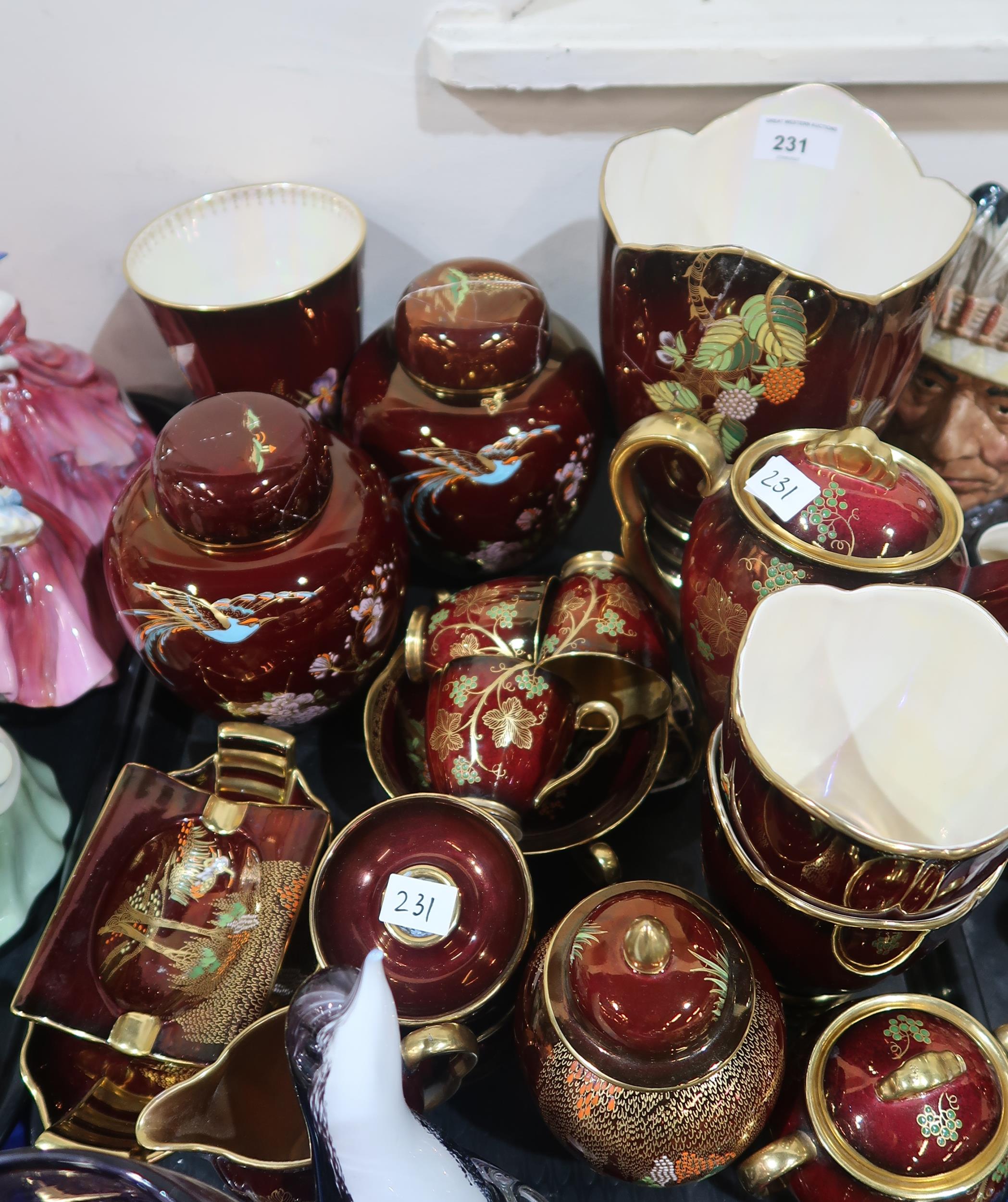 A collection of Carlton Ware rouge royale including vases, ginger jars etc Condition Report:No