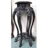 A 19th century Chinese jardinière stand with hexagonal marble inset top over carved pierced