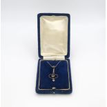 A 9ct gold Edwardian pendant necklace, set with aquamarine and pearls, length of chain 42cm,