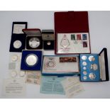A mixed lot of silver commemorative coins with a Royal Wedding $25, 25th Anniversary of the