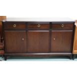 A mid 20th century Stag minstrel sideboard with three drawers over three cabinet doors, 81cm high