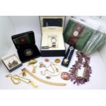 A 14k gold bangle, weight 4.7gms, 9ct shell pendant & chain weight 3.9gms, a rolled gold watch seal,