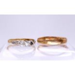 An 18ct gold three stone diamond ring, size N, (one diamond missing) together with an 18ct gold