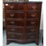 A 20th century mahogany serpentine front five drawer chest on shaped feet, 88cm high x 69cm wide x