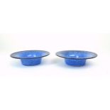 A near pair of Monart glass dishes in mottled blue, with purple rims and aventurine inclusions,