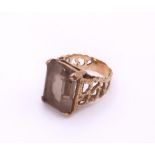 A retro 9ct gold smoky quartz ring, size P1/2, weight 8.6gms Condition Report:Available upon
