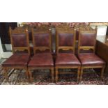 A set of eight Victorian oak dining chairs with burgundy leather upholstered splats and seats on