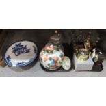 A large decorative ginger jar and cover, another jar and cover, assorted figures, clocks etc