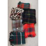 A quantity of tartan rugs and blankets and assorted crochet blankets Condition Report:No condition
