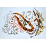 A string of statement amber beads, weight 142gms, Two strings of coral beads with matching