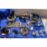A collection of Border Fine Art black Labrador groups, a Beswick Solomon of Wendover model and