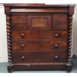 A Victorian mahogany Kilmarnock chest with ogee frieze drawer over four asymmetrical drawers (one