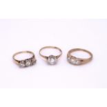 Three 9ct gold cz set rings, three stone L1/2, solitaire S1/2, heart shaped three stone R1/2, weight