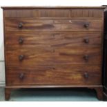 An Early 20th century mahogany chest of drawers with three short frieze drawers over four long
