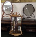 A lot including Georgian style walnut framed wall mirror and two assorted mahogany framed oval