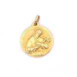 An Italian made St. Francis Of Assisi pendant diameter 2.5cm, weight 9.7gms Condition Report: