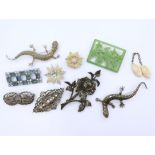 Two marcasite lizard brooches, one in silver, together with further silver marcasite brooches and