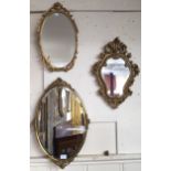 A lot of three assorted gilt framed mirrors to include two oval and one shaped framed wall