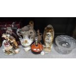 A porcelain holy family group, a Cheetah umbrella stand and assorted other items Condition Report:No