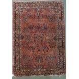 A lot comprising dark blue ground keshan rug with beige central medallion and spandrels, 136cm