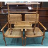 A lot comprising a pair of cane chinoiserie style armchairs, pine towel rail and a pine knife box (