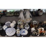 Assorted blue and white pottery, pottery dog figures and other items Condition Report:No condition