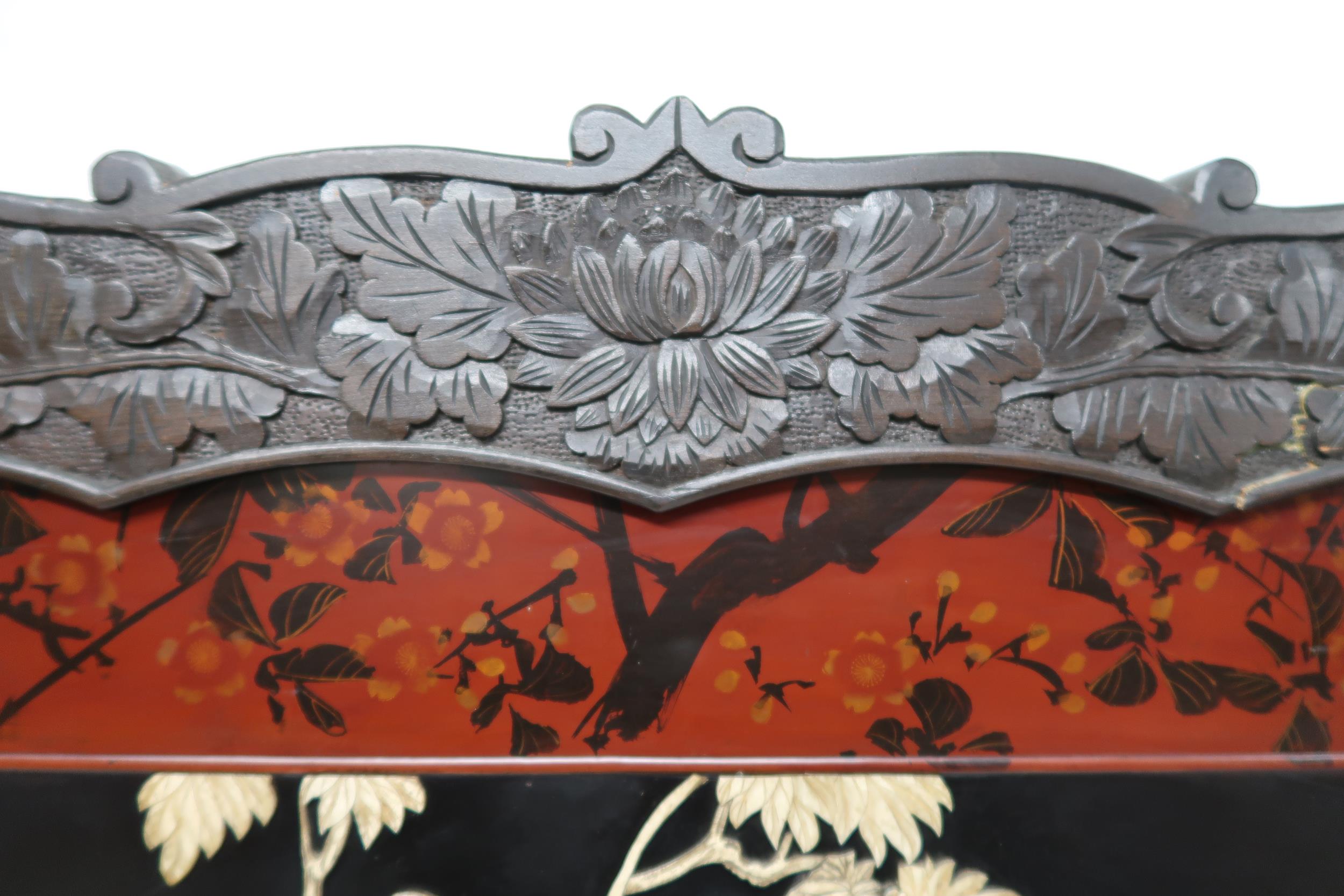 AN ORIENTAL HARDWOOD FRAMED LACQUERED TWO FOLD ROOM DIVIDER with foliate carved frame surrounding - Image 3 of 17