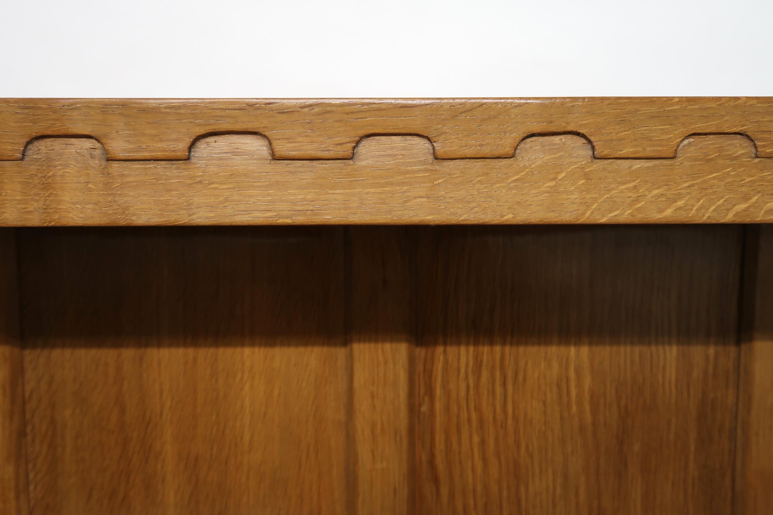 A PETER "RABBITMAN" HEAP OAK KITCHEN DRESSER with cornice carved with key design over two open plate - Image 10 of 13