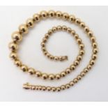 AN ITALIAN CHIAMPESAN BEAD NECKLACE the tapered in size beads from 11.2mm to 5mm are hollow and