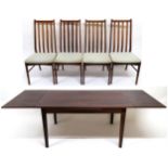 A MID-20TH CENTURY DANISH ROSEWOOD SPOTTRUP DINING TABLE AND FOUR CHAIRS  extending dining table