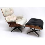 A CHARLES & RAY EAMES FOR HERMAN MILLER MODEL 670 LOUNGE CHAIR AND 671 OTTOMAN STOOL both with black