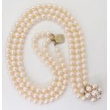 AN 18CT GOLD PEARL AND DIAMOND PEARL CLASP for a three-string pearl collar. Each pearl of approx 6.