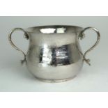 AN ARTS AND CRAFTS STYLE SILVER TWIN HANDLED SUGAR BOWL by James & William Deakin, London 1901, of