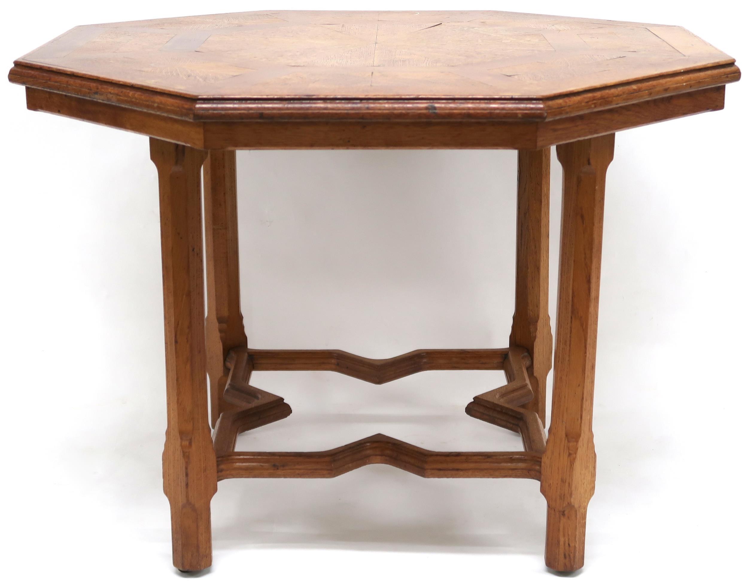 A VICTORIAN OAK PARQUETRY INLAID HOWARD & SONS LONDON OCTAGONAL CENTRE TABLE  with inlaid