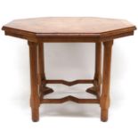 A VICTORIAN OAK PARQUETRY INLAID HOWARD & SONS LONDON OCTAGONAL CENTRE TABLE  with inlaid