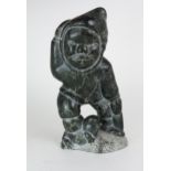 JOHNNY INUKPUK RCA (CANADIAN 1911-2007) INUK HOLDING ANIMAL  Soapstone carving, inscribed