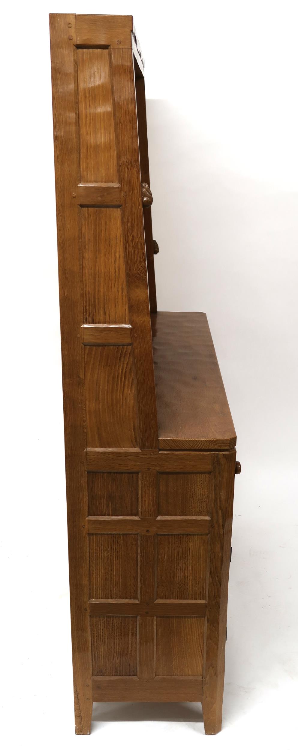 A PETER "RABBITMAN" HEAP OAK KITCHEN DRESSER with cornice carved with key design over two open plate - Image 12 of 13