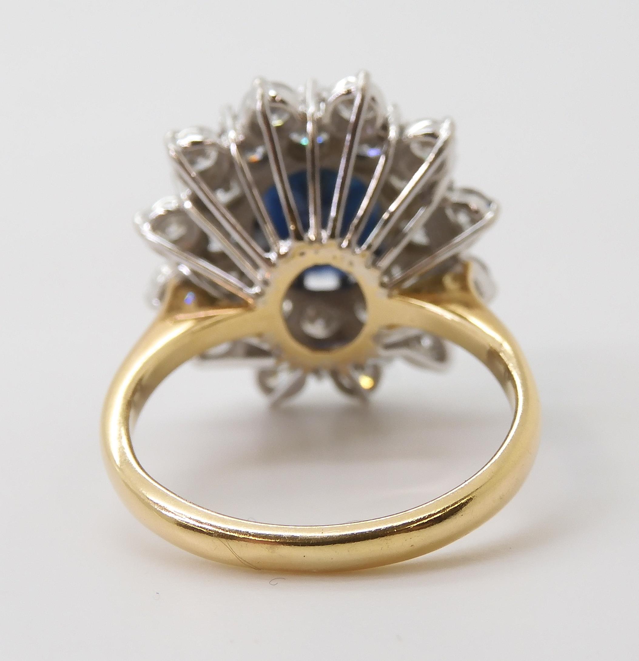 A SAPPHIRE AND DIAMOND CLUSTER RING the 16.8mm x 18mm cluster, mounted throughout in yellow and - Image 6 of 8