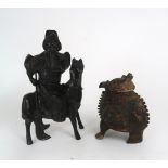 A BRONZE WARRIOR ON HORSEBACK 27cm high and an Archaic style grotesque animal censer, 17.5cm high (