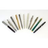 A COLLECTION OF PENS Including a Cartier plaque d'or simulated malachite ballpoint example, a Parker