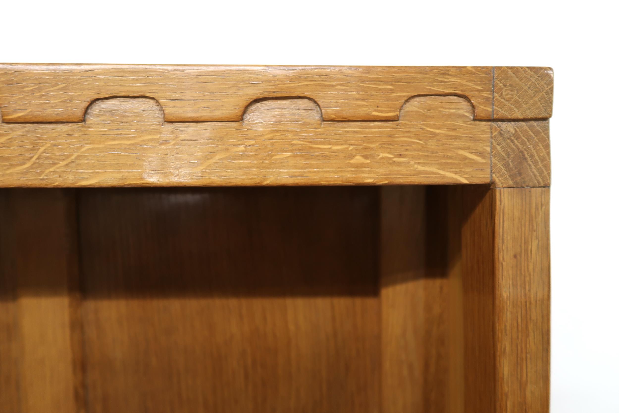 A PETER "RABBITMAN" HEAP OAK KITCHEN DRESSER with cornice carved with key design over two open plate - Image 9 of 13