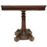 A GEORGIAN ROSEWOOD FOLDOVER TEA TABLE  with rounded corner fold-over top on quatreform pedestal