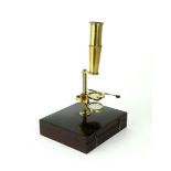 AN EARLY-VICTORIAN LACQUERED BRASS GOULD-TYPE MICROSCOPE BY CARY, LONDON Contained in a velvet-lined