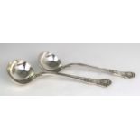 A PAIR OF VICTORIAN SILVER SAUCE LADLES by John James Whiting, London 1855, in the Queen's