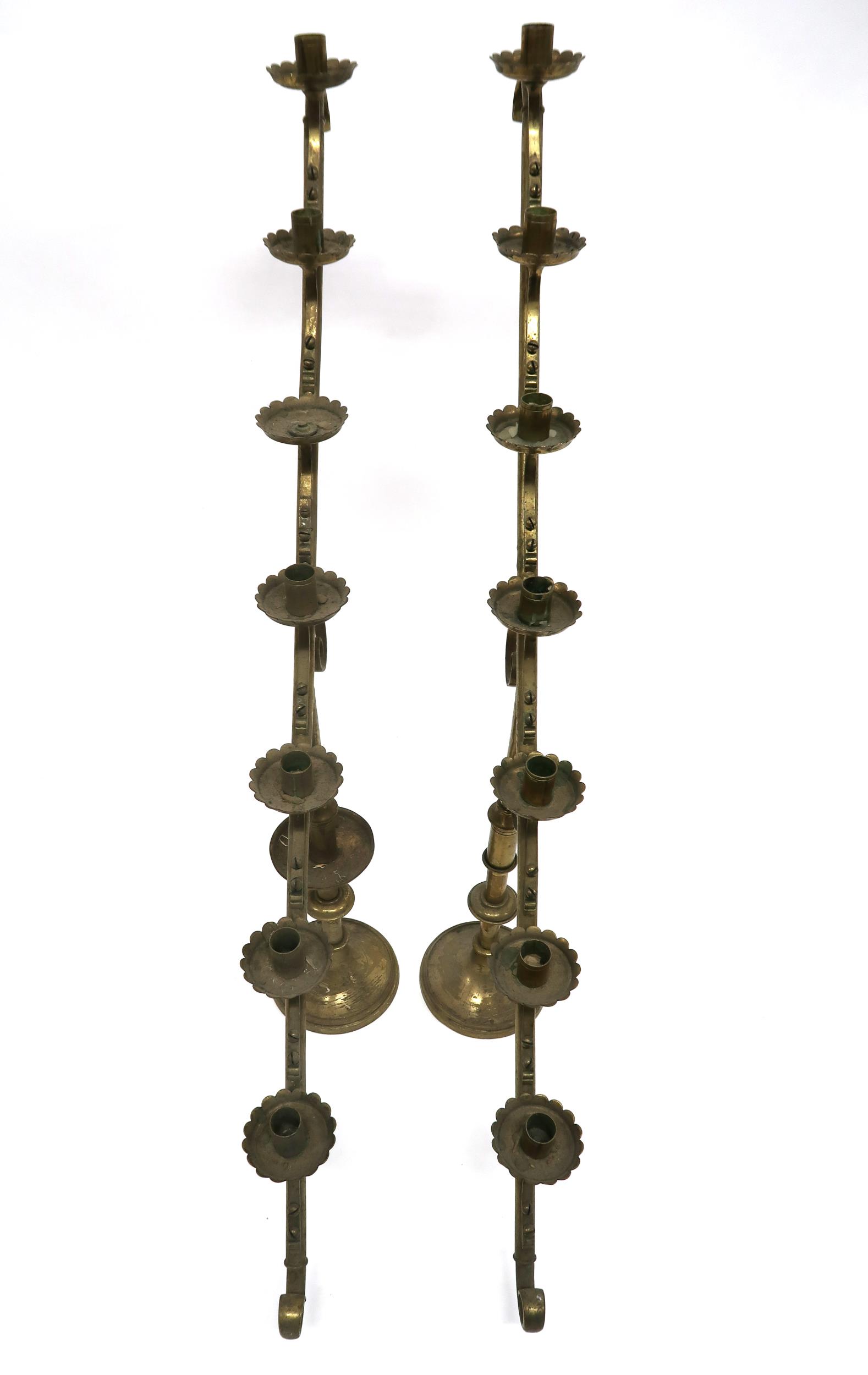 A PAIR OF 19TH CENTURY BRASS ECCLESIASTICAL SLOPED CANDELABRA each with seven candle holders with - Image 5 of 6