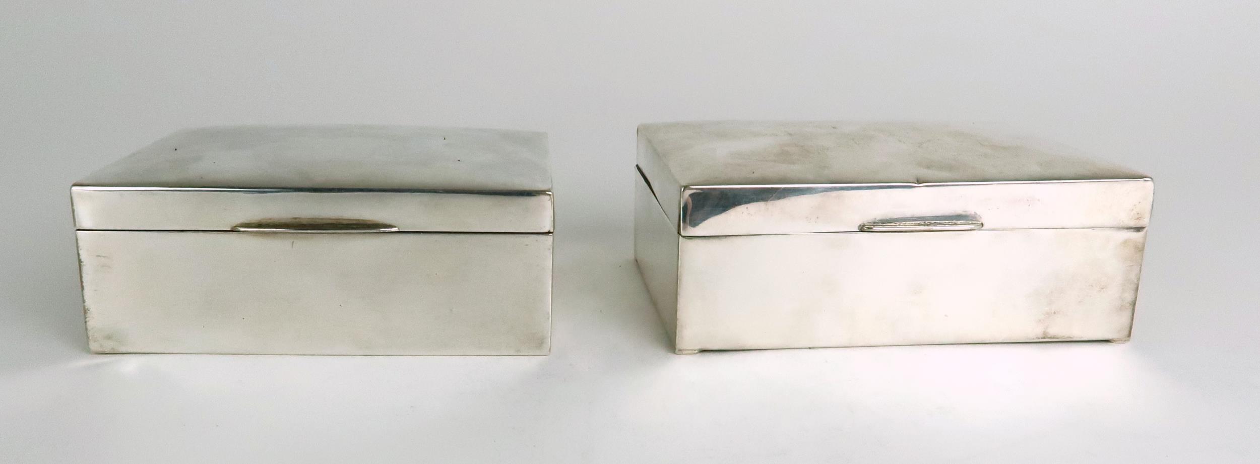 A GEORGE V SILVER CIGARETTE BOX by A J Zimmerman, Birmingham 1921, of rectangular form, 11 x 8.