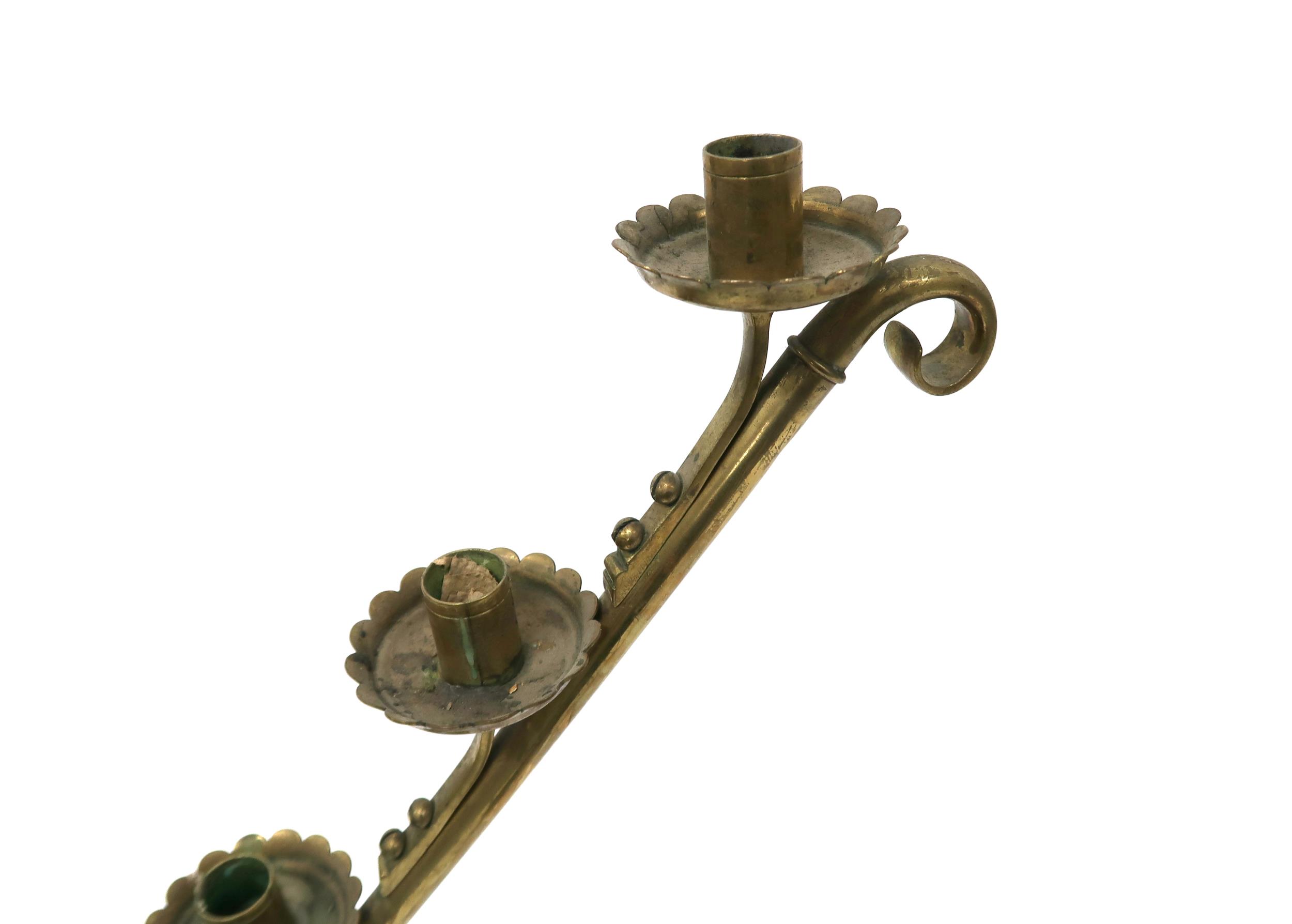 A PAIR OF 19TH CENTURY BRASS ECCLESIASTICAL SLOPED CANDELABRA each with seven candle holders with - Image 6 of 6