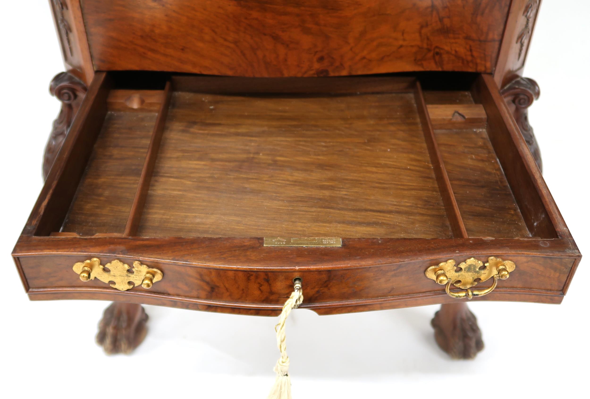 A 20TH CENTURY WALNUT METAMORPHIC DRINKS CABINET  with shaped cantilever top concealing bottle - Image 3 of 11