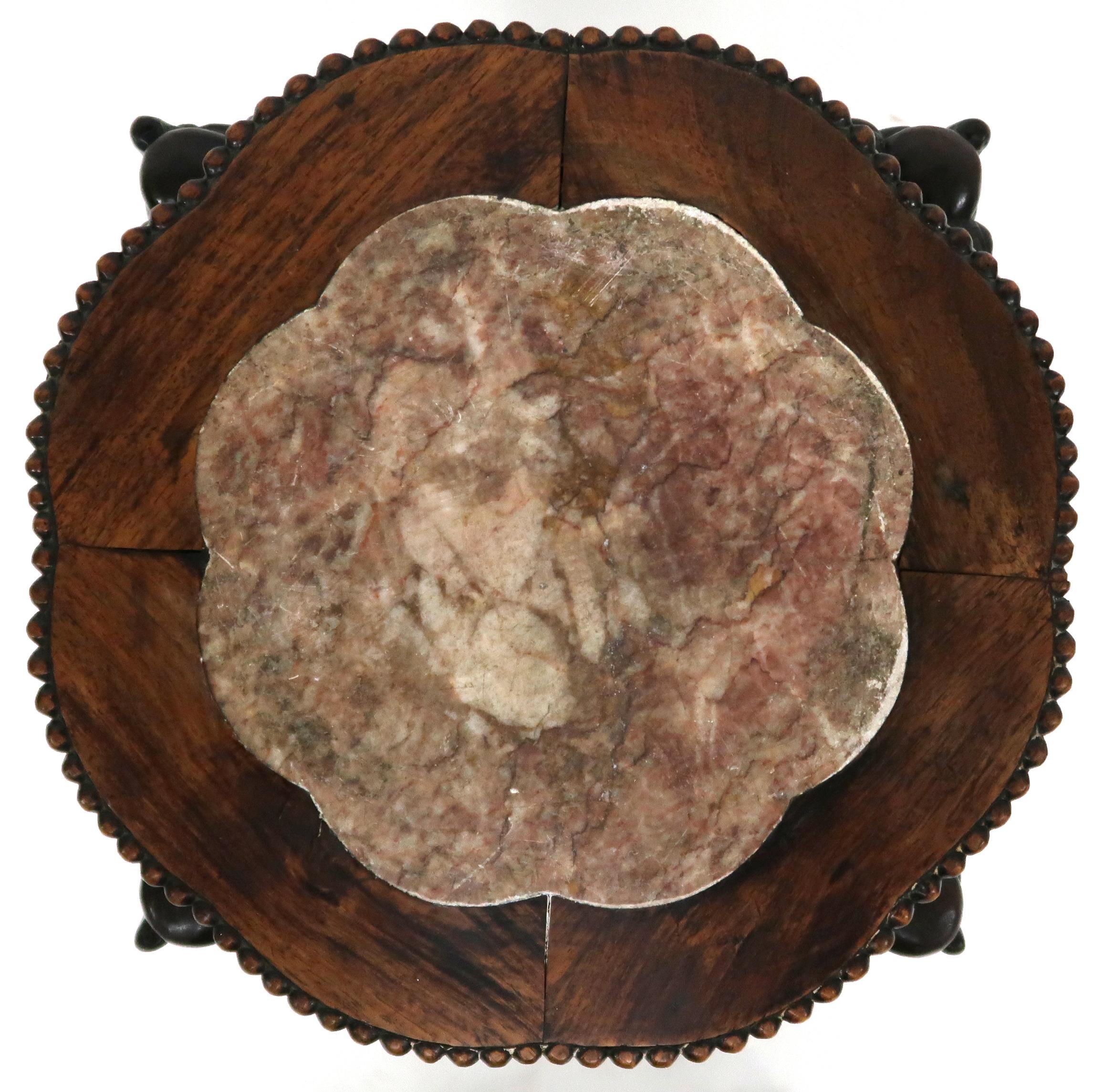 A CHINESE HARDWOOD JARDINERE STAND  with shaped top inset with pink marble over floral carved - Image 3 of 9