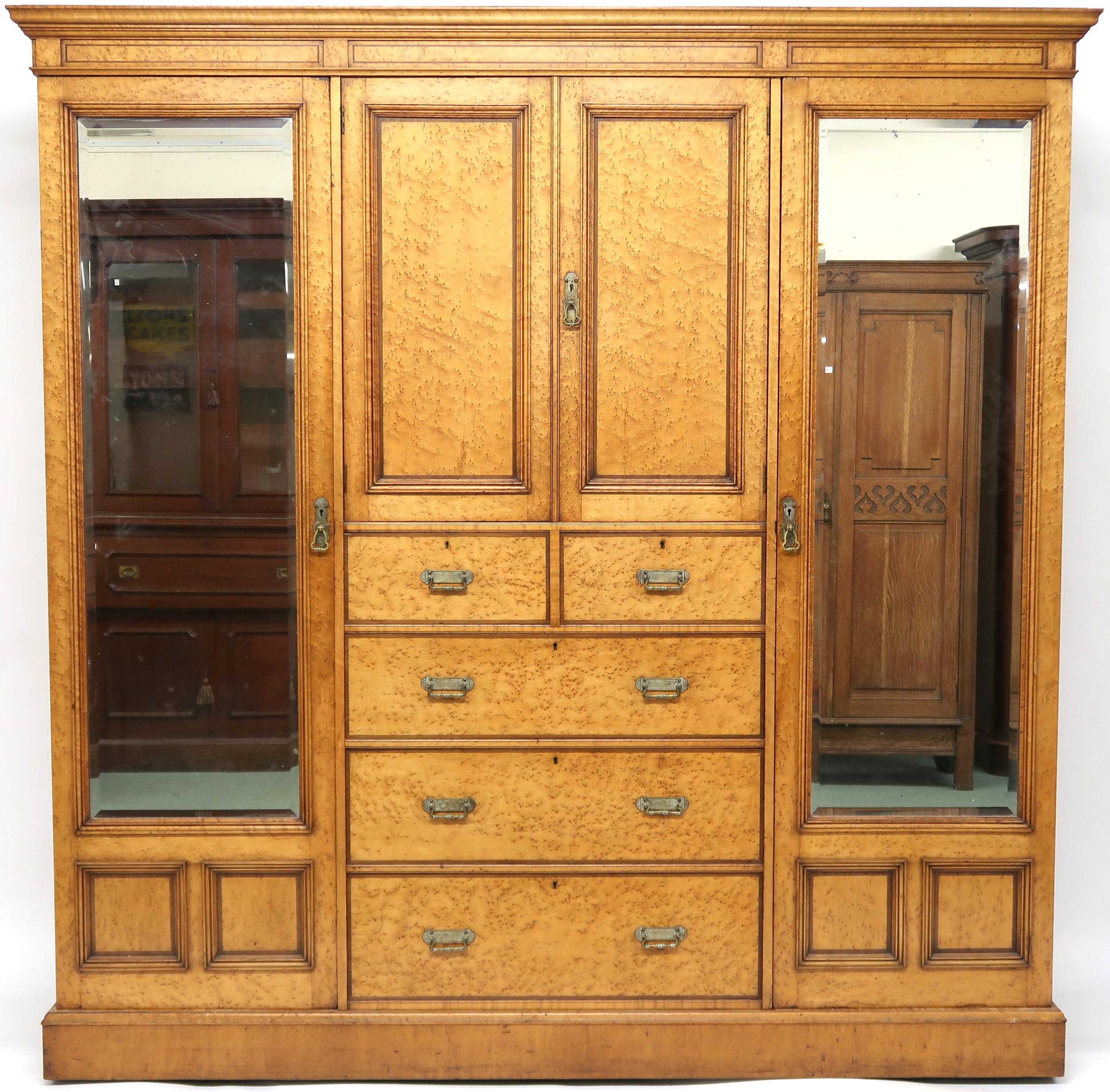 A VICTORIAN BIRDSEYE MAPLE COMPACTUM WARDROBE & ACCOMPANYING BEDSIDE CABINET wardrobe with moulded